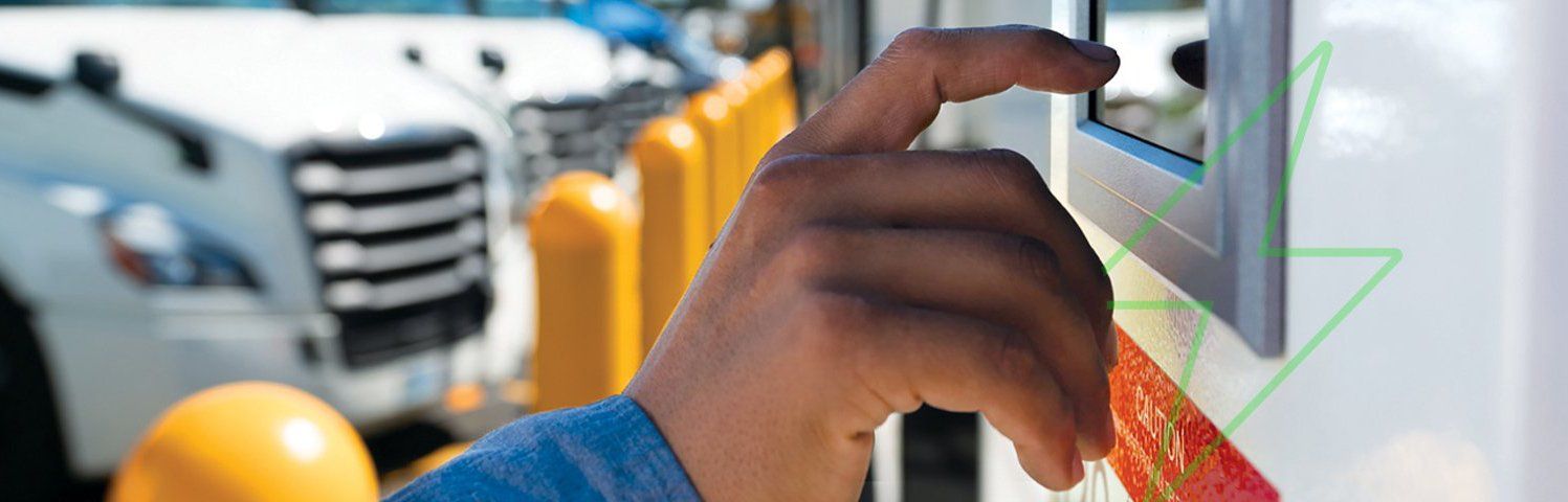 Finger touching digital screen on charging station